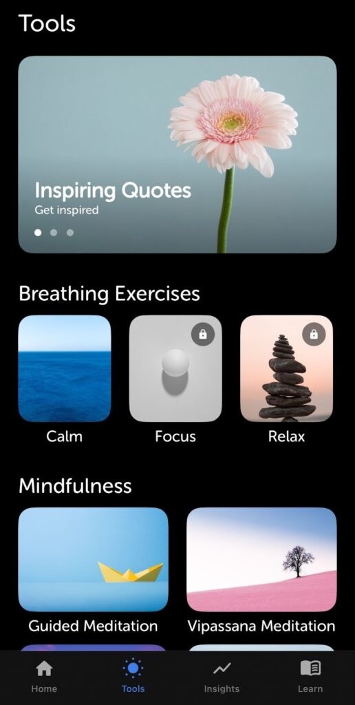 Mobile app screen showing sections for Inspiring Quotes, Breathing Exercises (Calm, Focus, Relax), and Mindfulness (Guided Meditation, Vipassana Meditation); some features are locked.